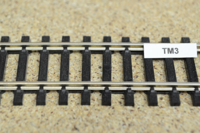 Repair sealant for covering holes in track sleepers, black, 15g