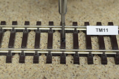 Repair sealant for covering holes in track sleepers, brown 4, 15g